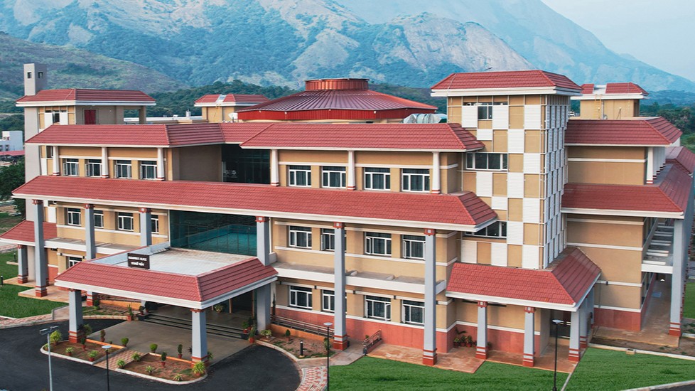 IIT Palakkad campus building against a mountain backdrop